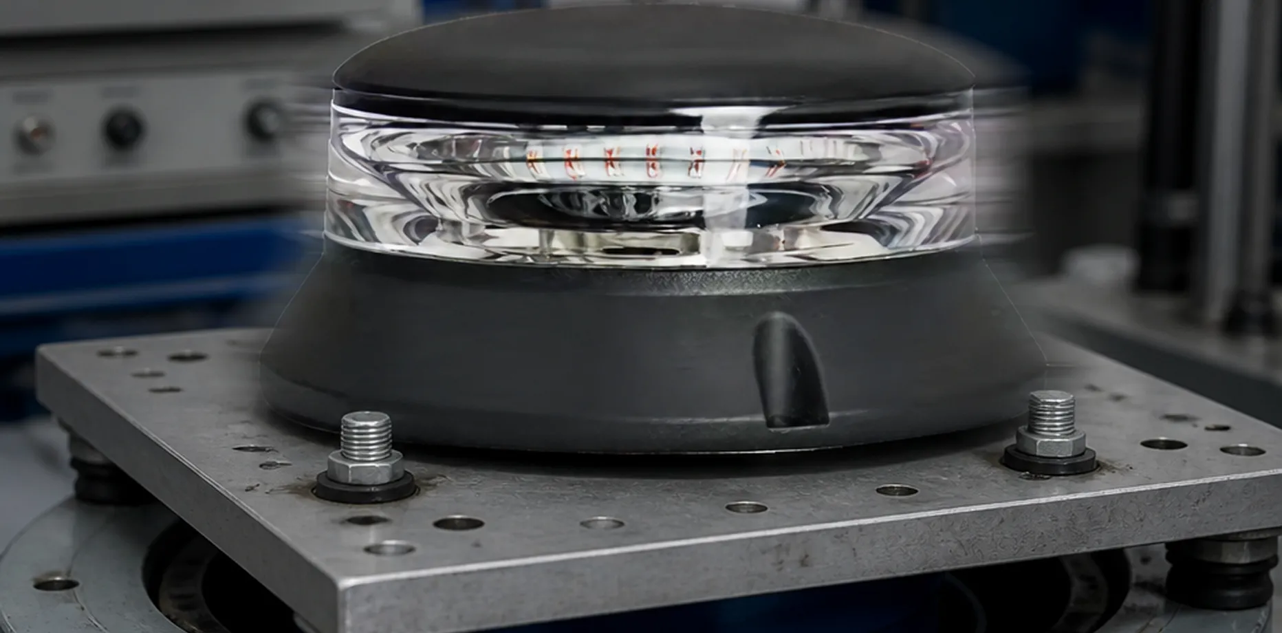 Automotive lighting product undergoing waterproof testing